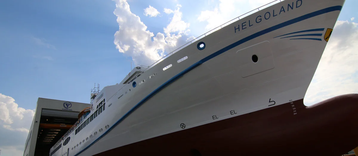 Ferry Helgoland leaving the Fassmer shipbuilding hall in Berne. Launched in 2015, it was Germany’s first seagoing ferry powered by LNG, marking a milestone in environmentally friendly shipbuilding.