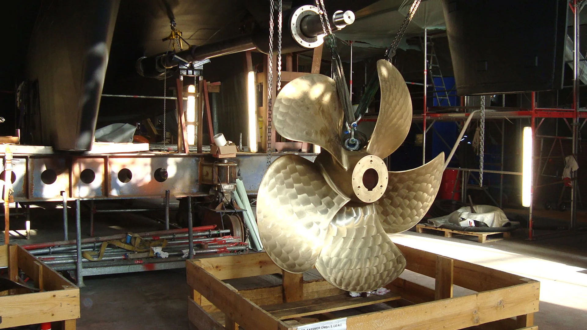Ship propeller during a yacht refit at Fassmer shipyard, close-up in the workshop